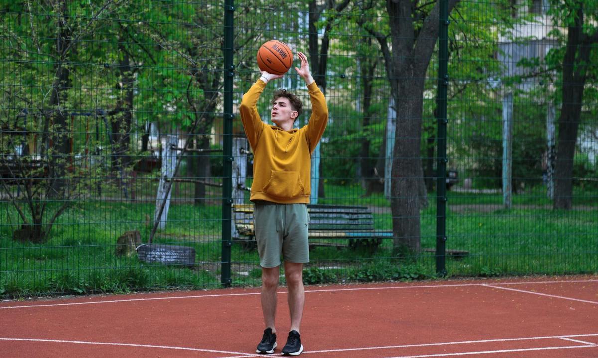 teenager playing basketball