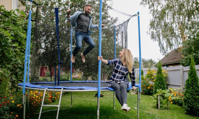 man jumping on trampoline