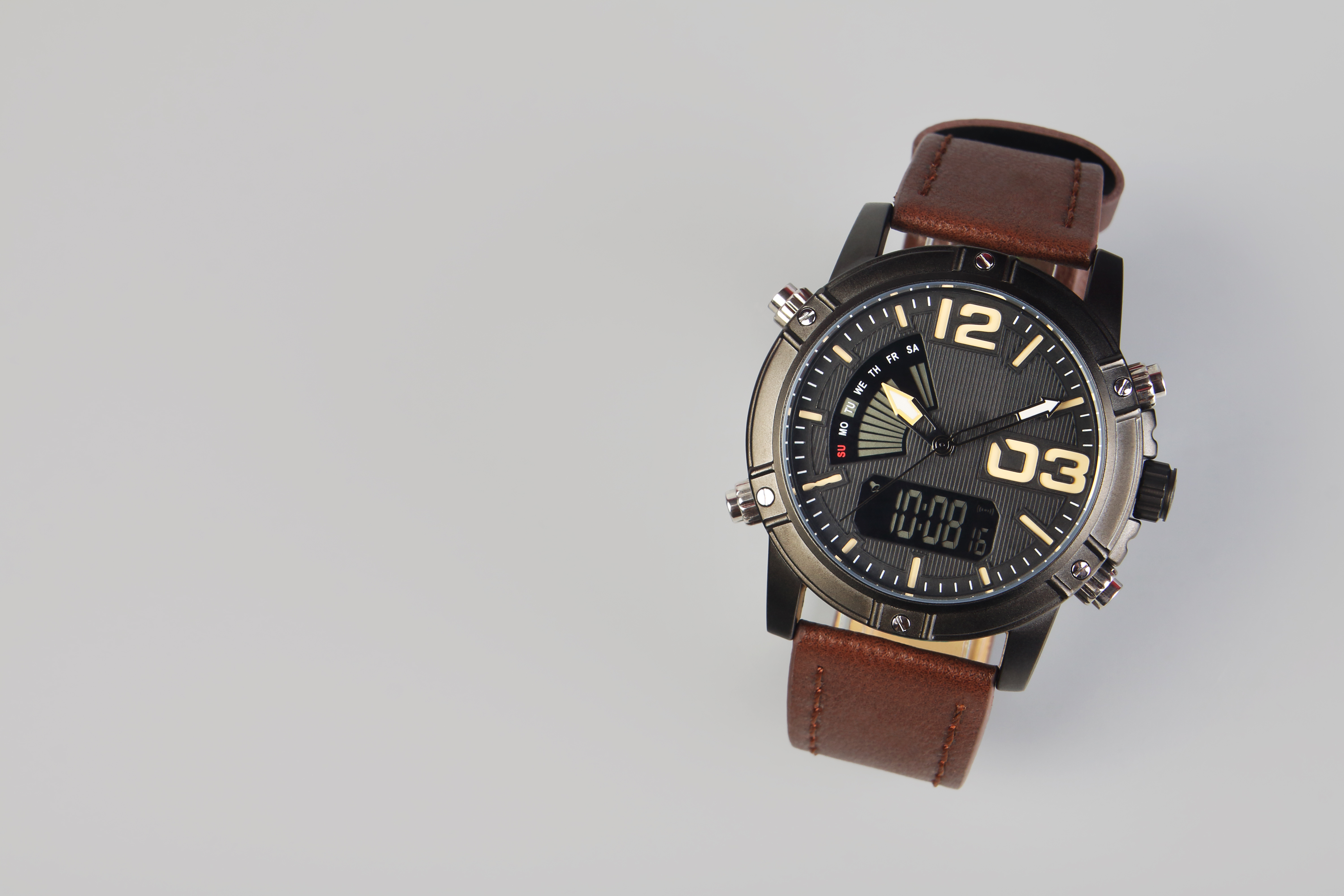 Men's wrist watch on gray background