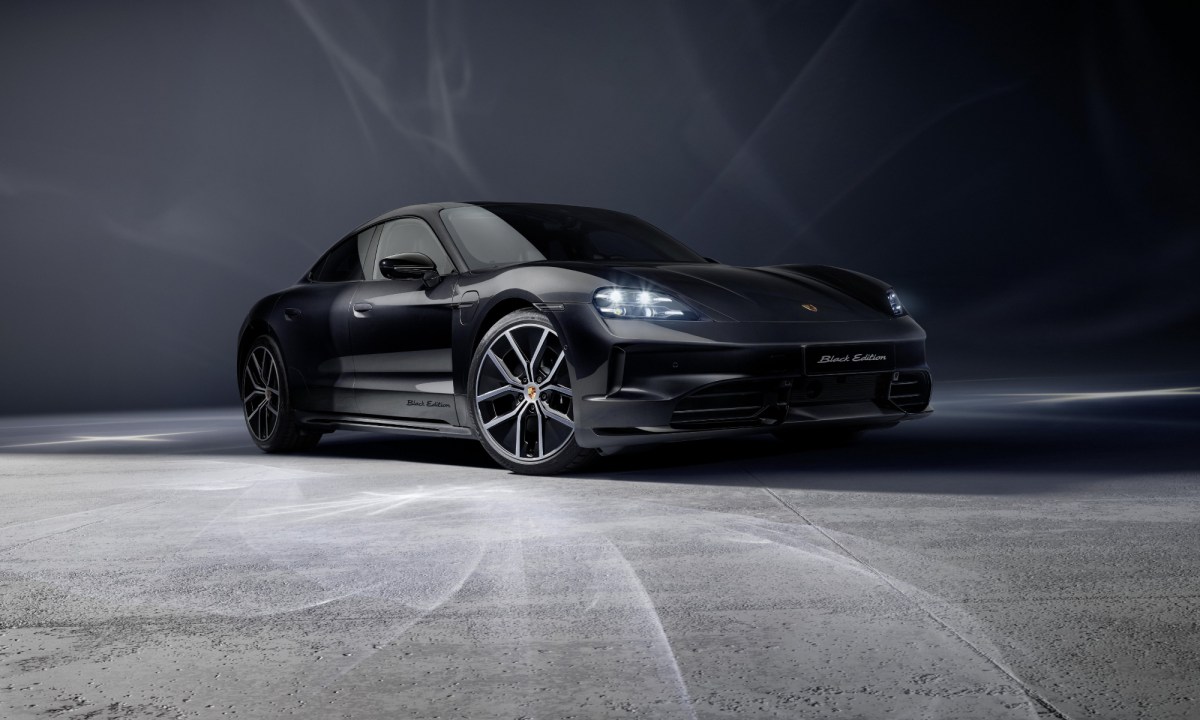 2026 Porsche Taycan Black Edition peosuxt highlight shot right front three-quarter view.