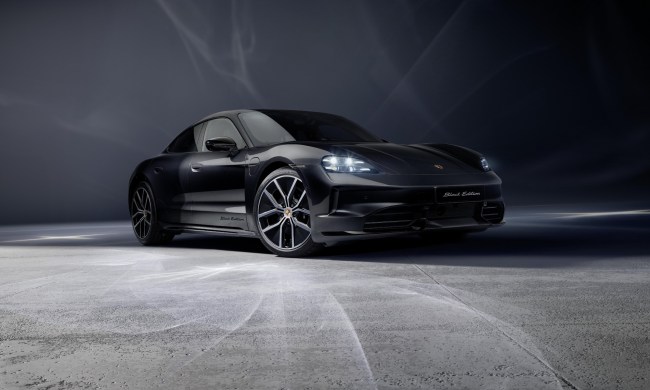 2026 Porsche Taycan Black Edition peosuxt highlight shot right front three-quarter view.