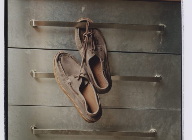boat shoes hanging from metal cabinet