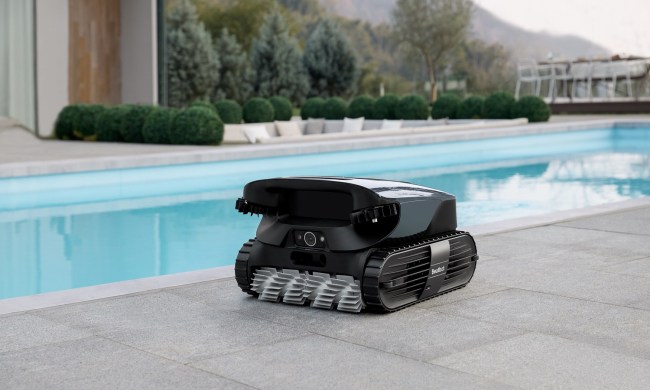 The Beatbot AquaSense 2 Ultra robotic pool cleaner beside the swimming pool.