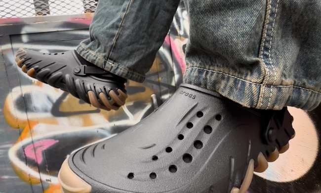 person wearing crocs echo gum ro clog
