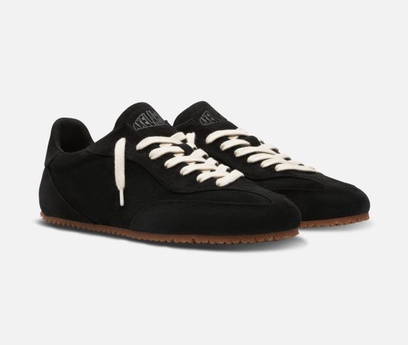 black axel arigato sneakers