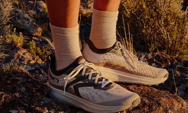 man wearing keen sneaker in dirt