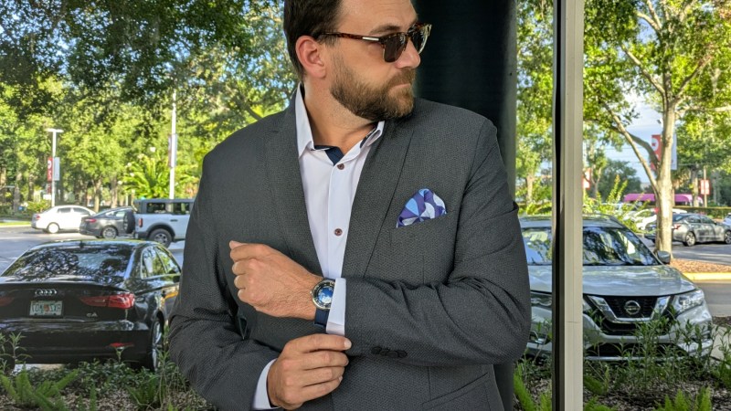 Man in Twillory suit adjusting his cuff