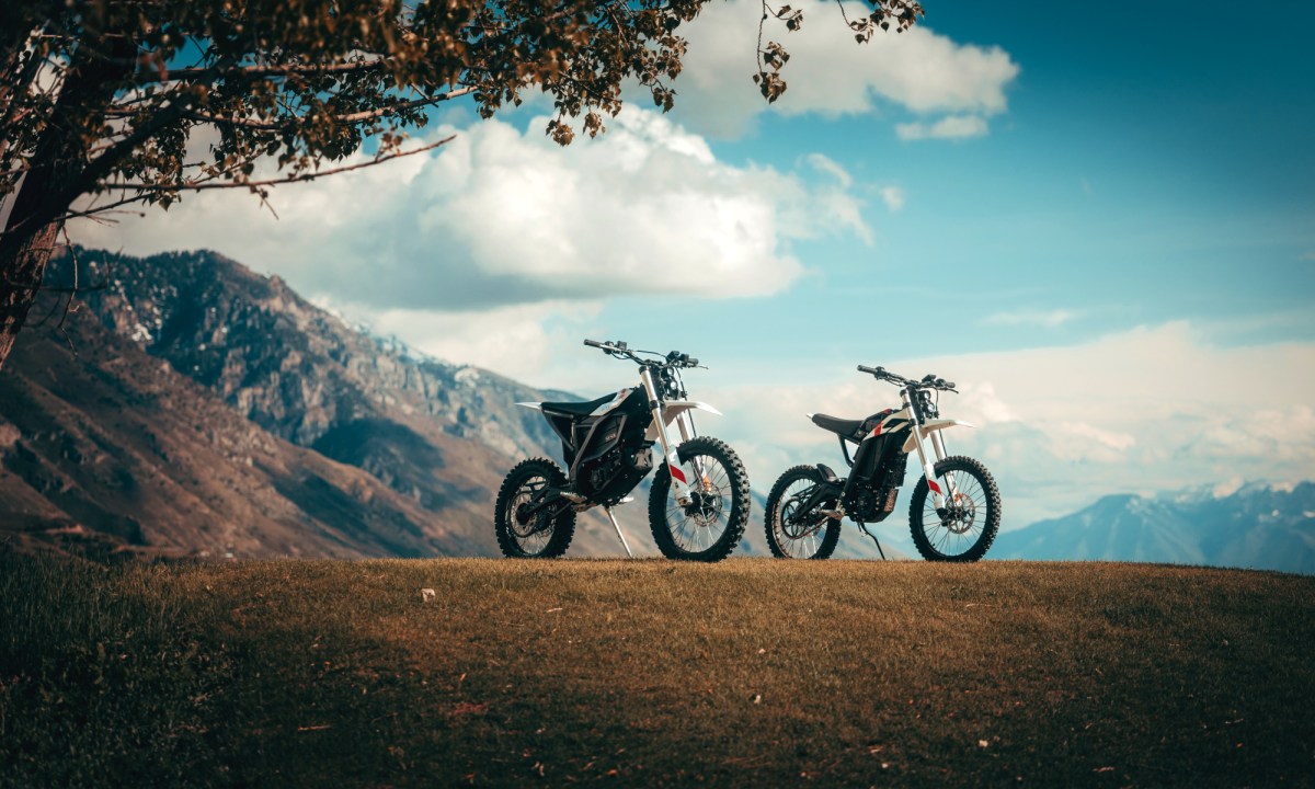 Two 2026 Zero Motorcycle XLine electric adventure motorcycles parked in the desert against a clear skyline.