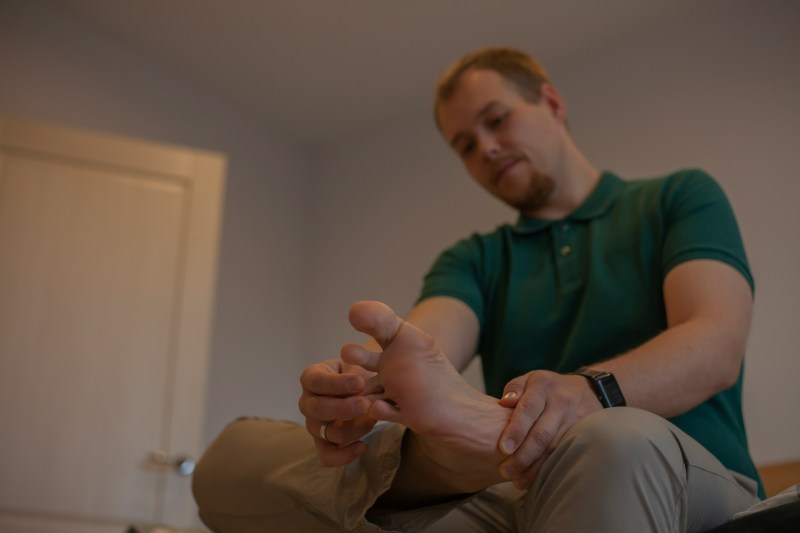 man with foot pain