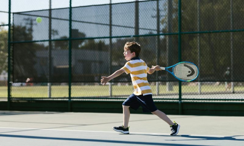 kid child playing tennis