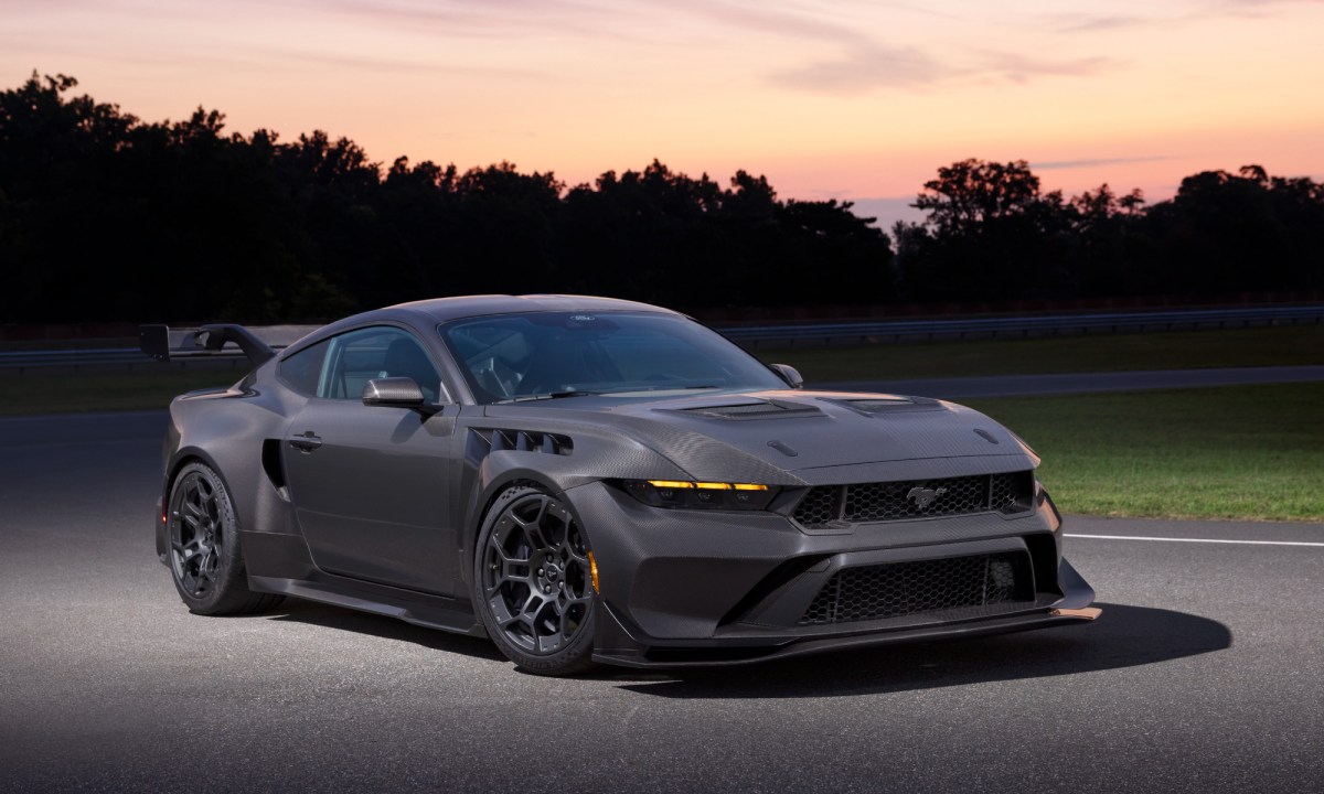 2025 Mustang GTD Liquid Carbon parked on a racetrack right front three-quarter view.