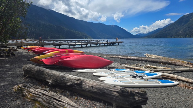 Kayaks and paddleboards along the shore