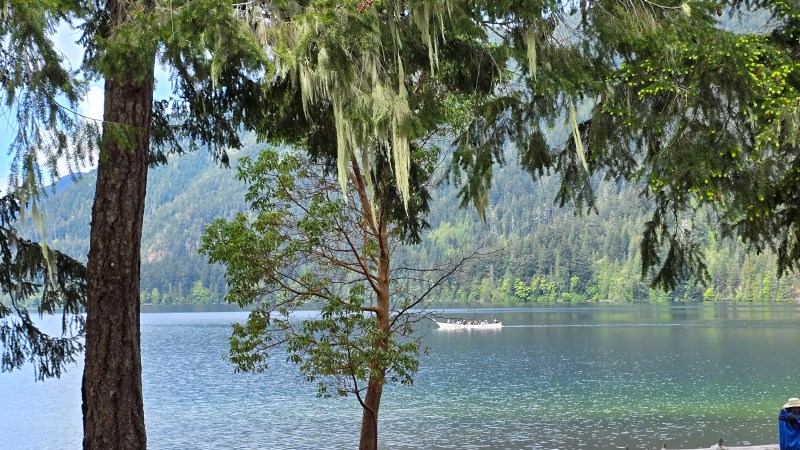 A row boat crossing Lake Crescent