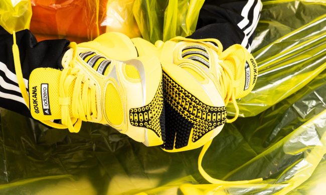 man wearing adidas adizero sneakers