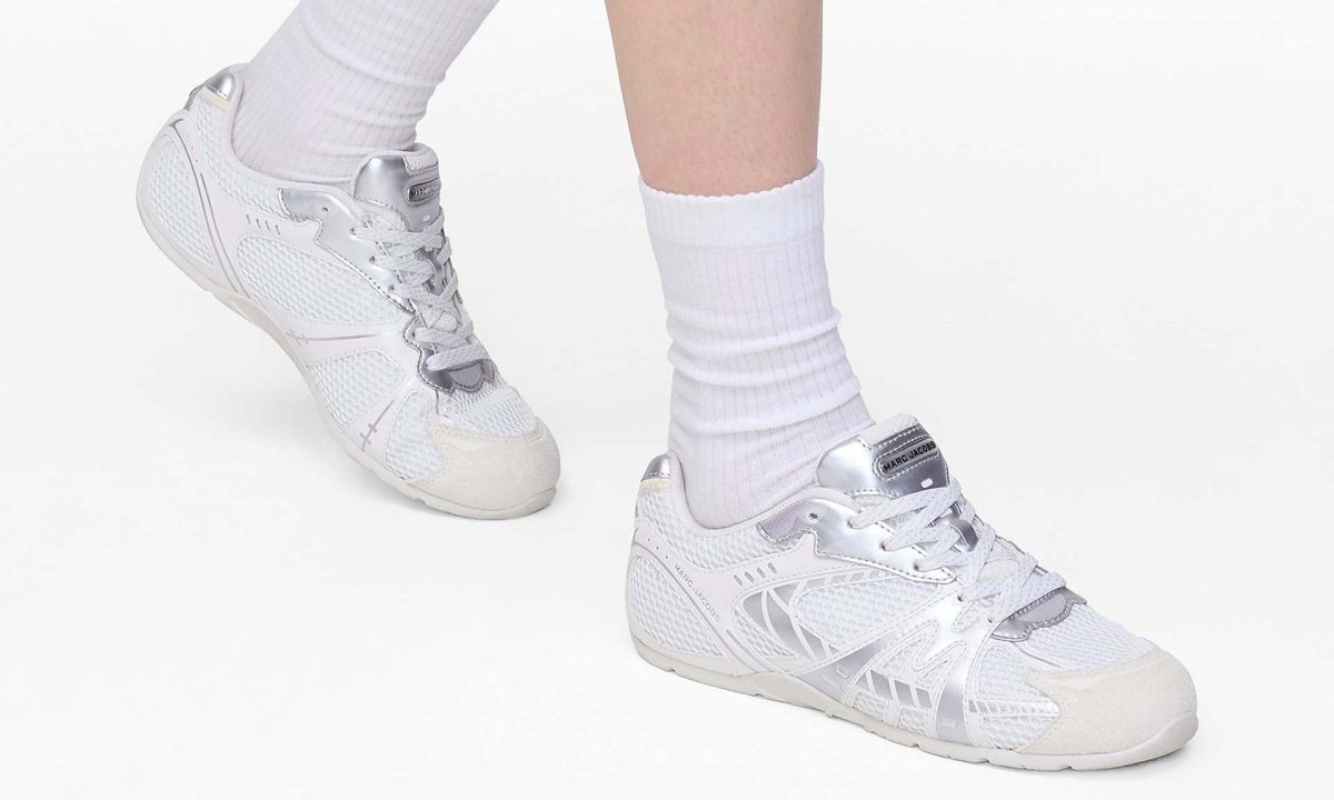 model wearing white silver marc jacobs sneakers