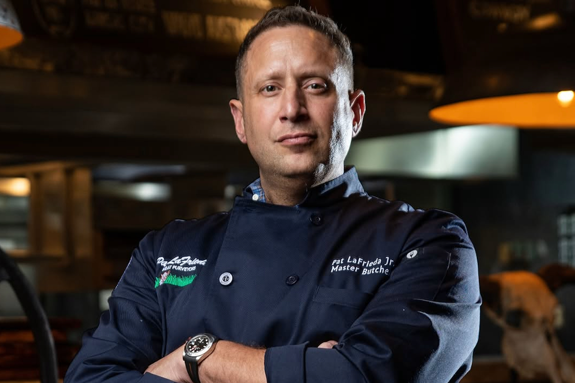 Pat LaFrieda headshot in a blue chef coat
