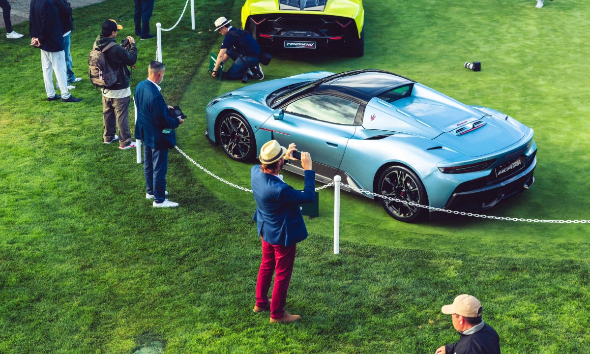 Photographers shooting the Maserati MCPURA Cielo Concept on the lawn during Monterey Car Week 2025.