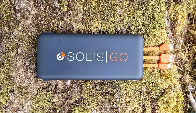 Solis Go device with charging cords on the ground