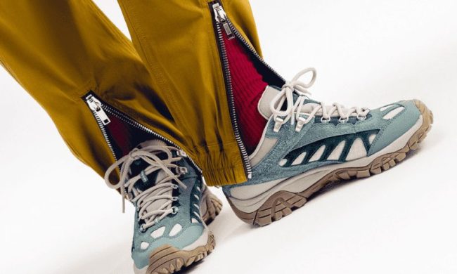 man wearing merrell sneakers