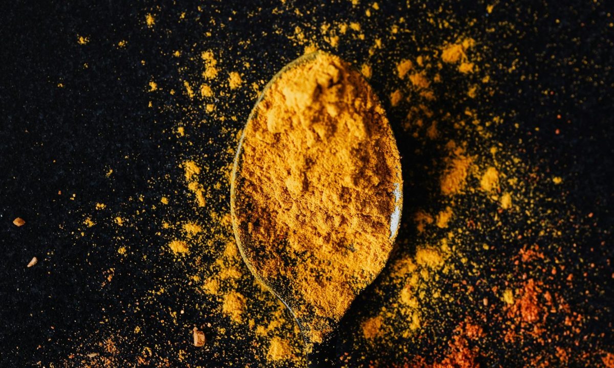 turmeric spice on spoon