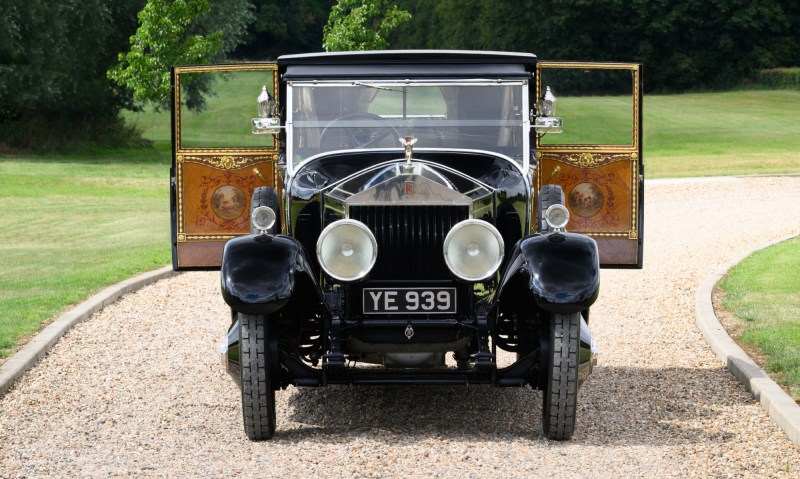 The Phantom of Love Rolls Royce front view with open doors at Hampton Gardens.