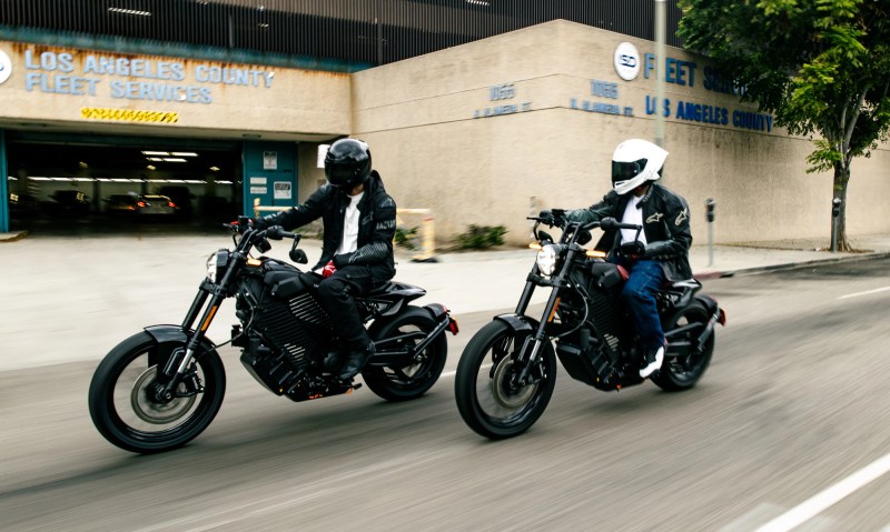 Two riders on LiveWire S2 Mulhollands on a city street.