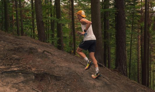 man running uphill on an incline