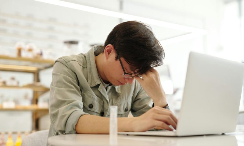 man sitting at desk