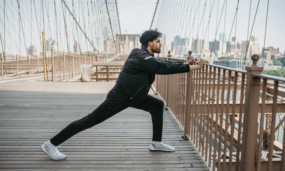 man stretching exercising outside