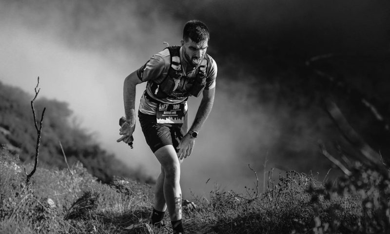 man running marathon uphill